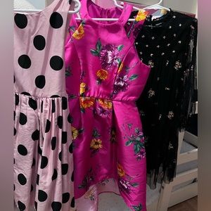2 floral dresses and 1 polka dot dress sizes 7-8 girls